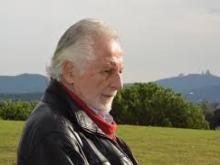 dimitri roussopoulos staring into the distance